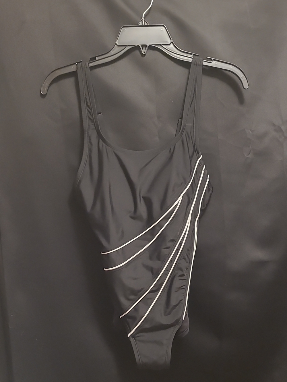 Roots black one-piece swimsuit features distinctive white piping accent SIZE 6